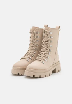 Tamaris Snowboots- White -Tamaris Verkoopwinkel 036c59d829d44b9885407c85c2b0969b scaled